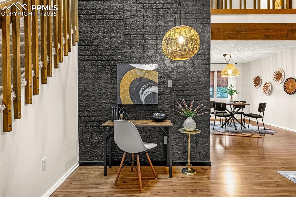 Image 5 of 19: Accent wall makes a perfect office or sitting area