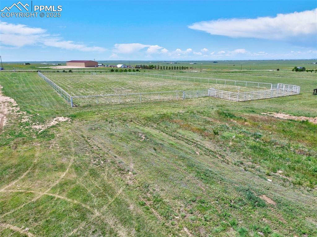 Image 40 of 50: Riding Arena is fenced with 2" Round Pipe
