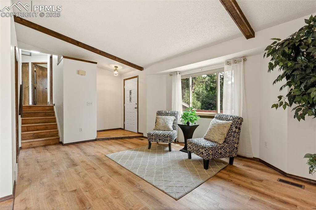 Image 11 of 32: Front entry with coat closet.