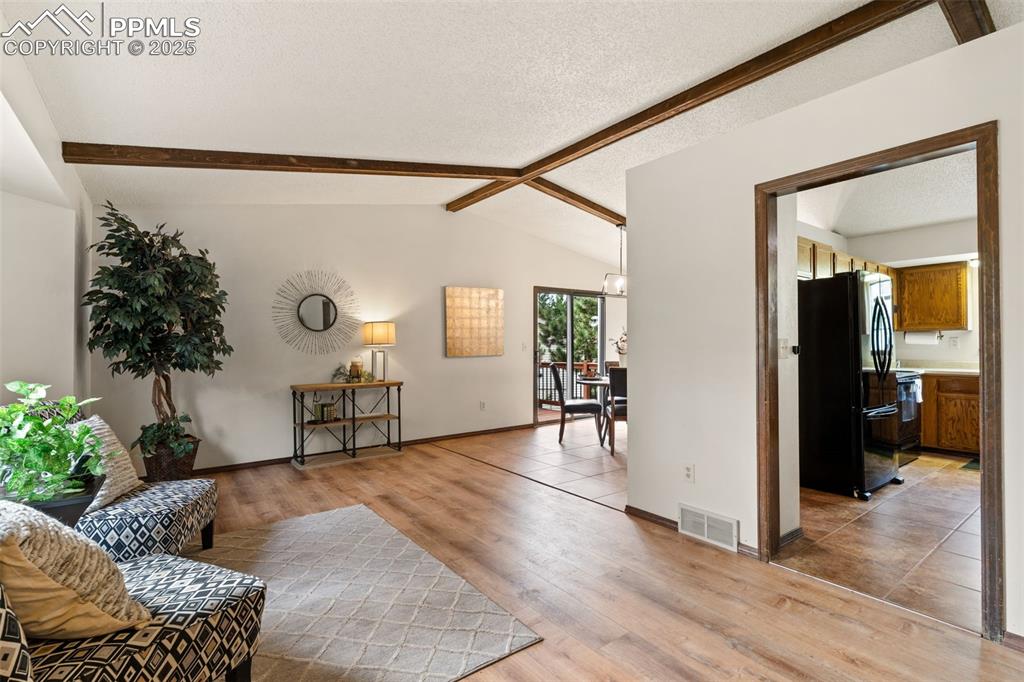 Image 12 of 32: Living room/dining room combination