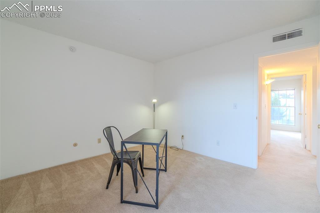 Image 21 of 27: Unfurnished office with carpet flooring