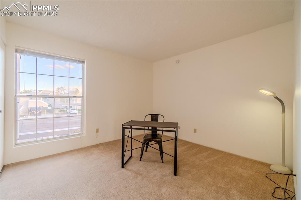 Image 22 of 27: Unfurnished office featuring carpet flooring