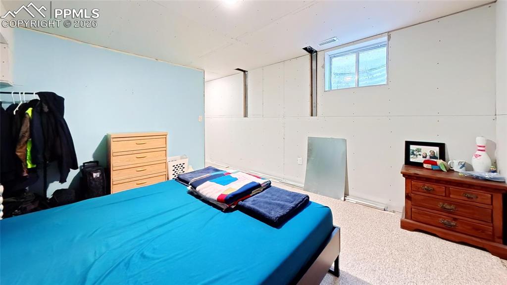 Image 20 of 29: basement bed non conf