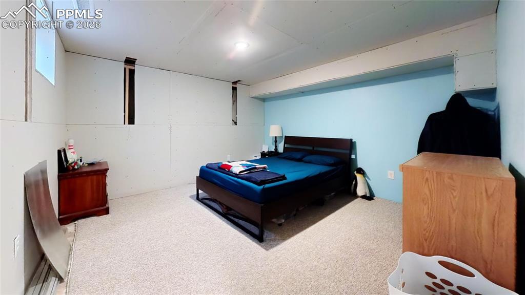 Image 21 of 29: basement bed non conf