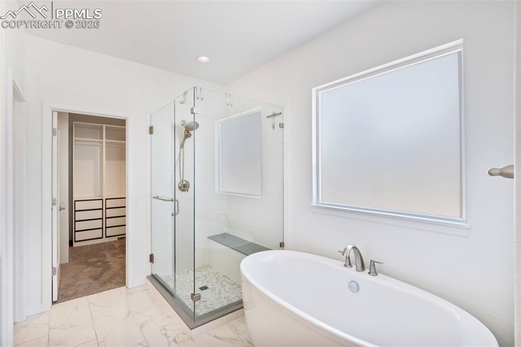 Image 18 of 44: Well appointed primary bathroom!