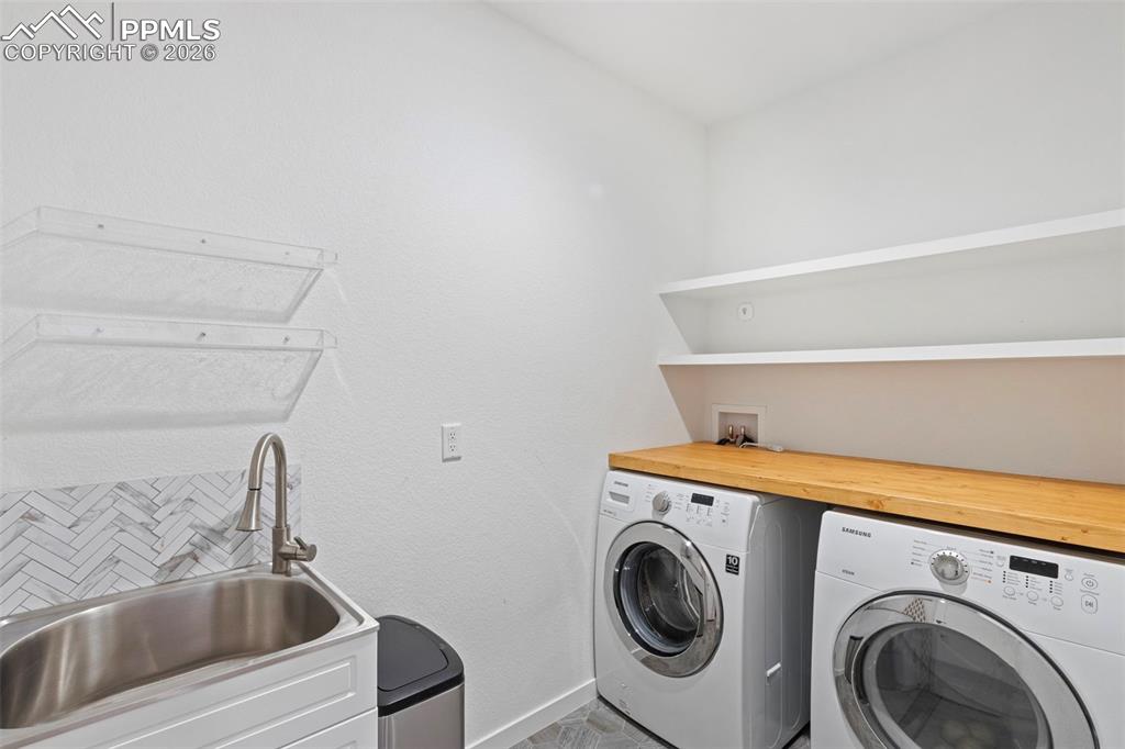 Image 24 of 44: Main level laundry room