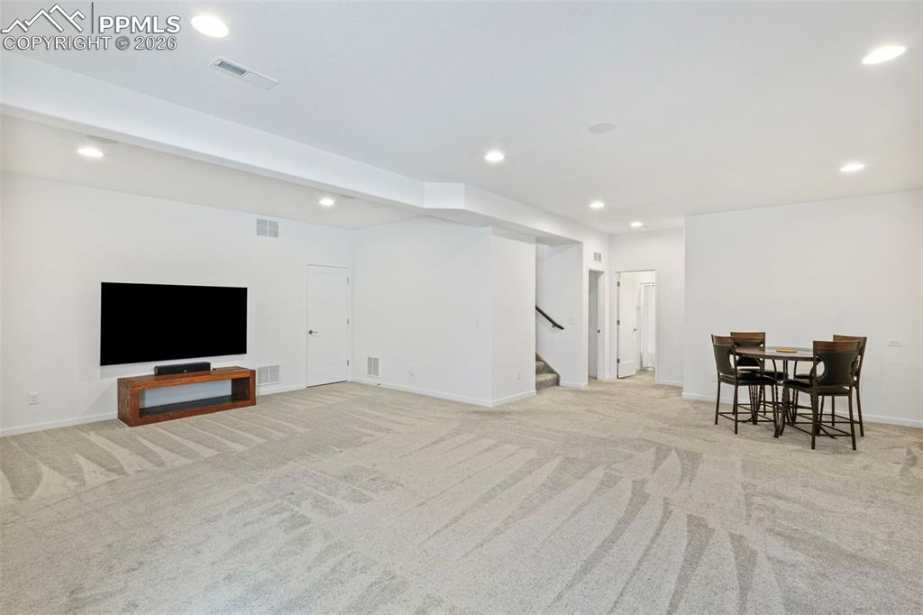 Image 25 of 44: Huge basement with a large unfinished are great for storage!