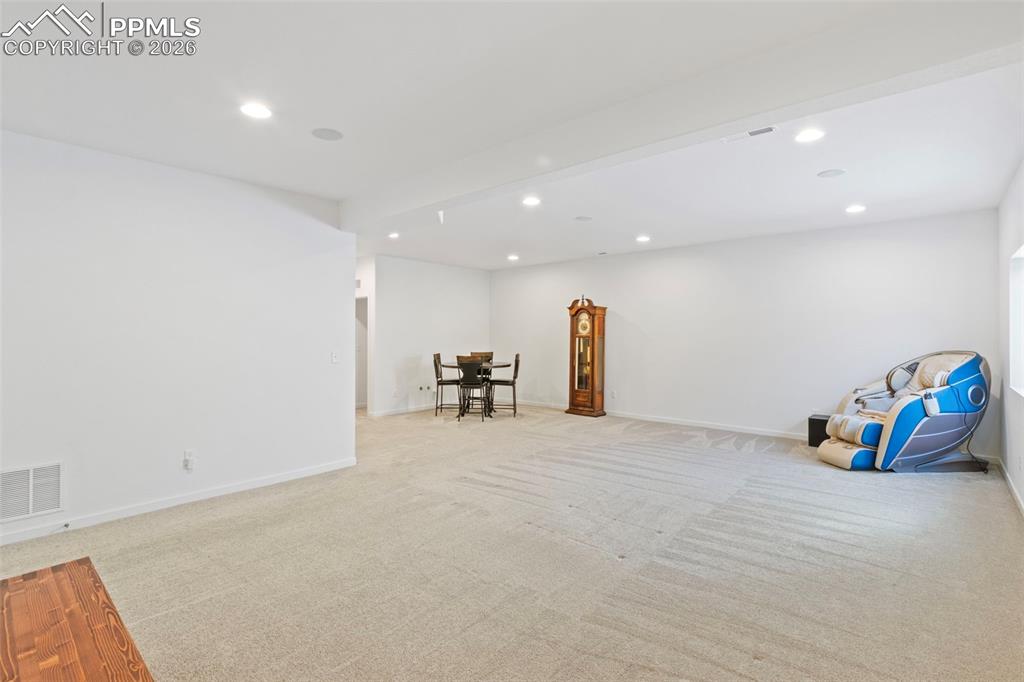 Image 26 of 44: Huge basement with a large unfinished are great for storage!