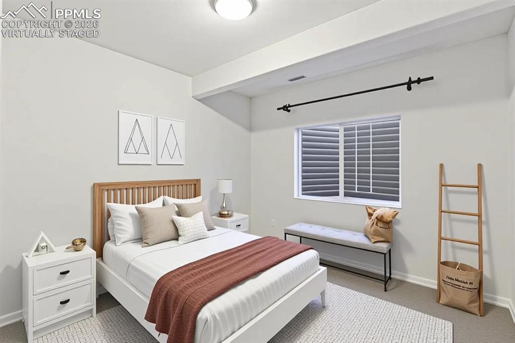 Image 32 of 44: Virtually Staged basement bedroom 2