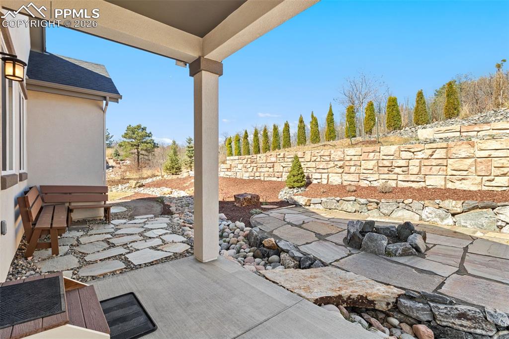 Image 36 of 44: Covered patio and plenty of privacy!