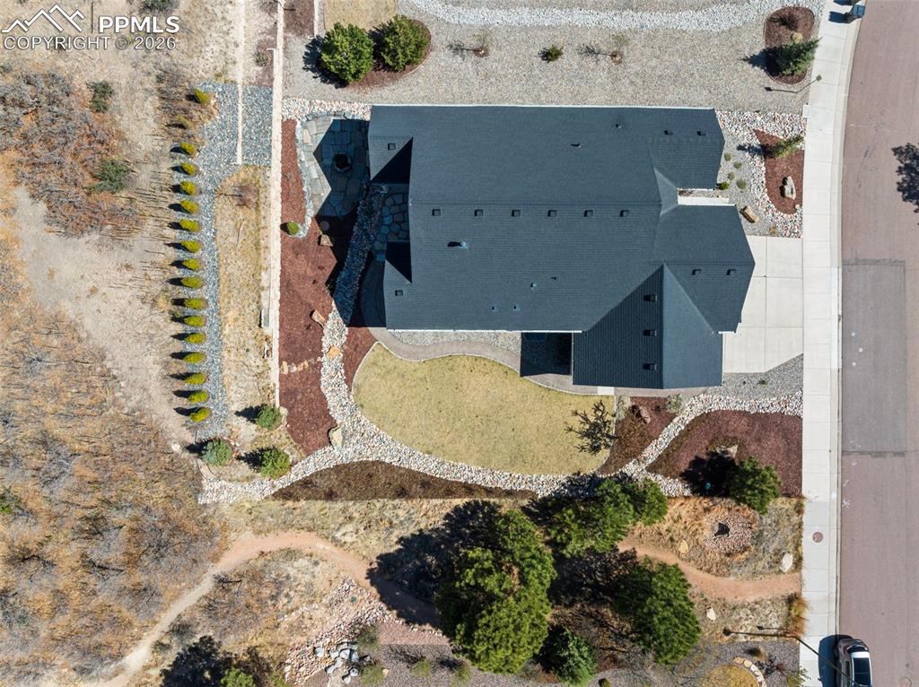 Image 40 of 44: Private trail that leads straight to the park directly behind the home