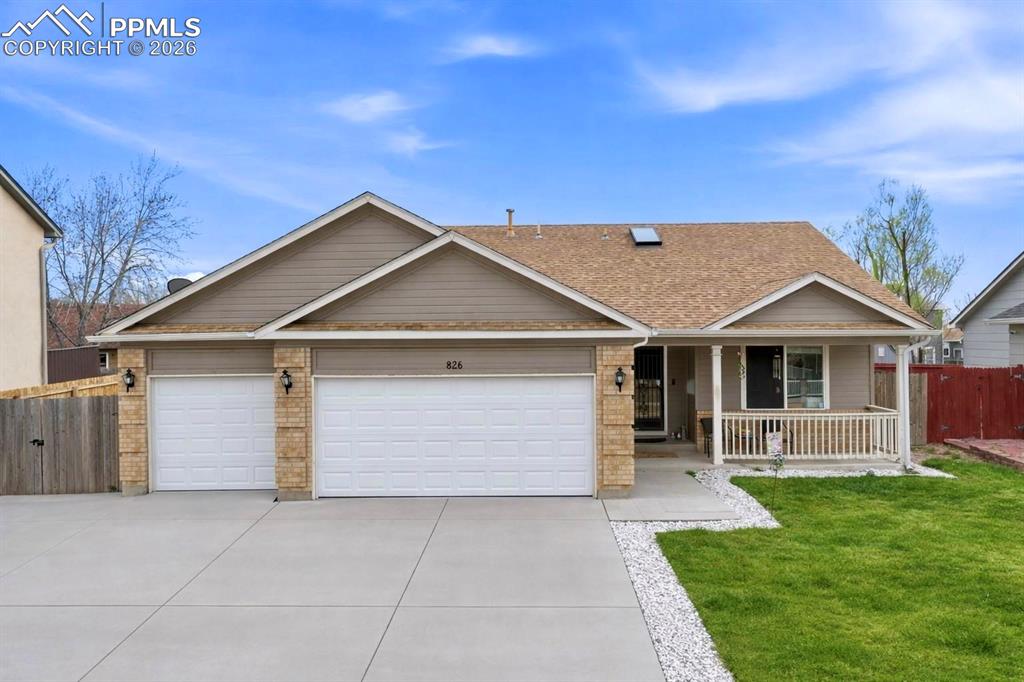 Caption: Ranch home with 3 car garage covered front porch