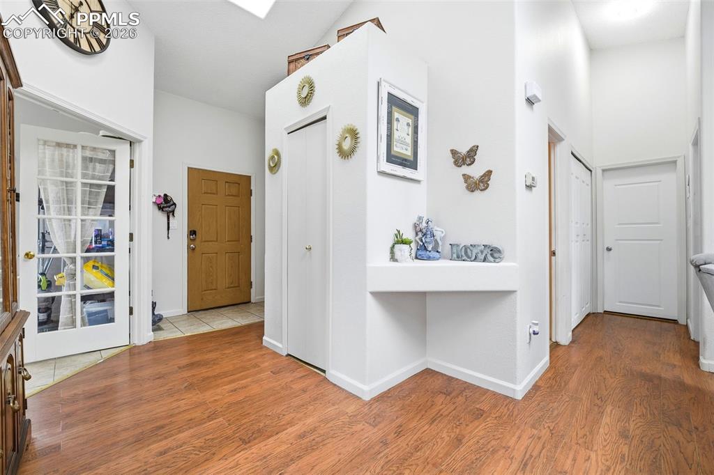 Image 2 of 18: Bright entry with open layout