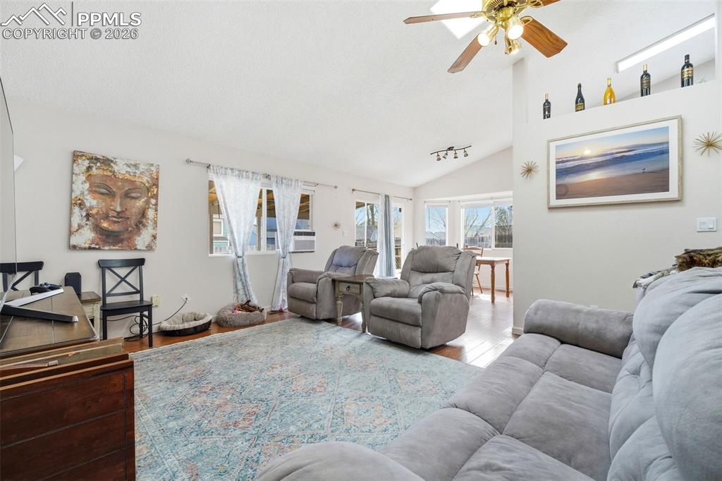 Image 7 of 18: Light-filled living space with great flow