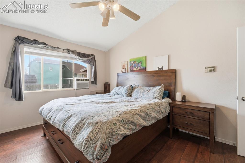 Image 9 of 18: Spacious primary bedroom with natural light