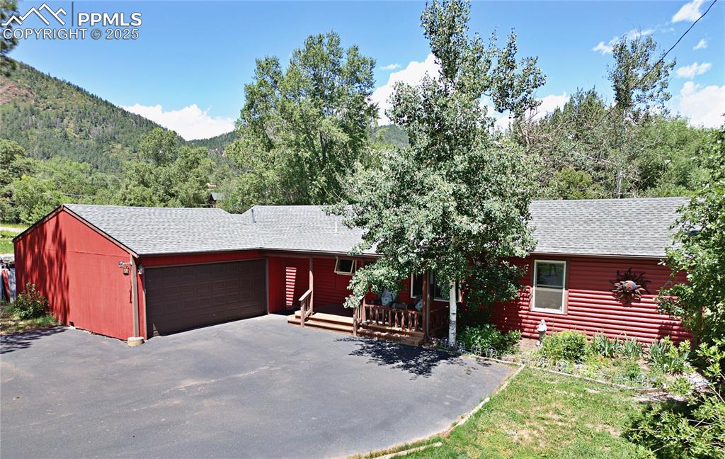 Caption: Welcome to the 
Little Red Cabin by the Creek!