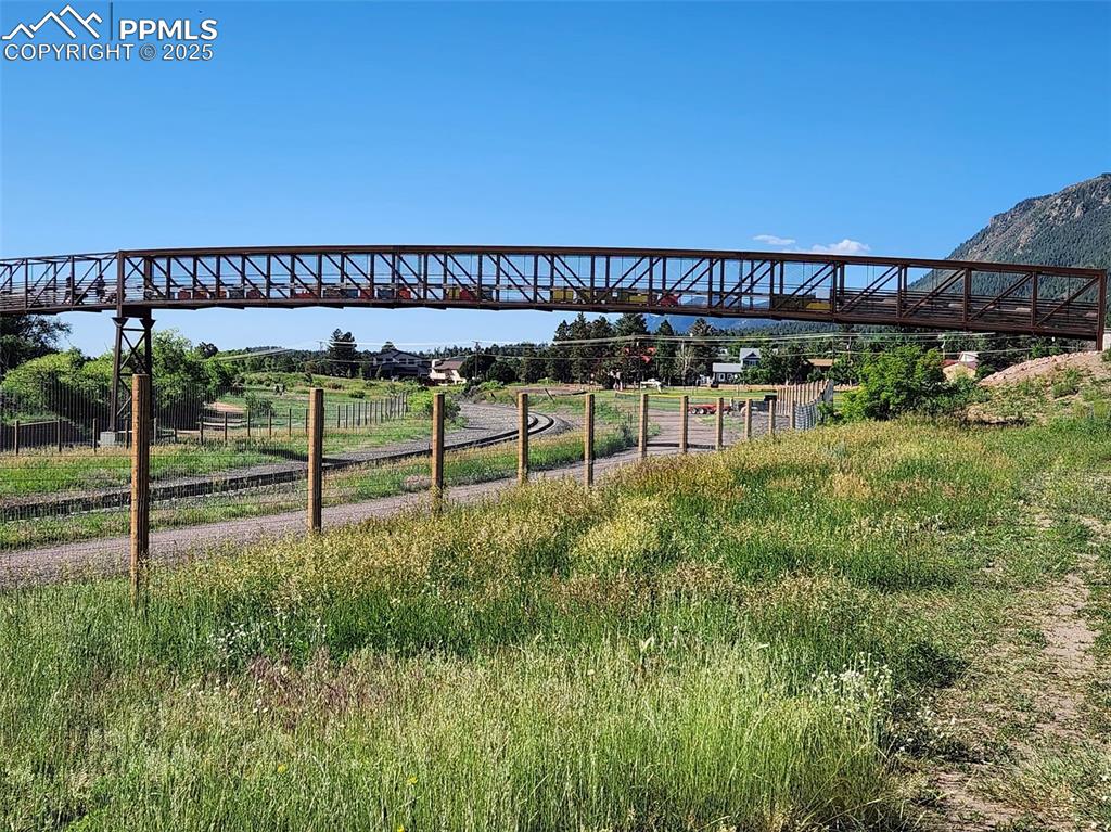Image 33 of 36: Pedestrian bridge across the railroad tracks at the Palmer Lake Recreation 