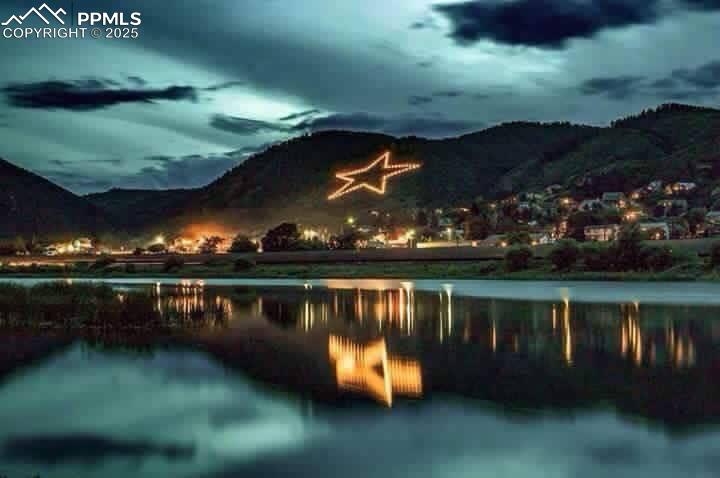 Image 34 of 36: Just a few blocks to the Lake!  The Palmer Lake Star is the largest illumin
