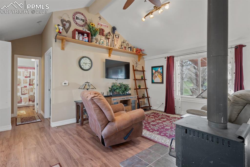 Image 9 of 36: Wood-burning stove for cozy winters!