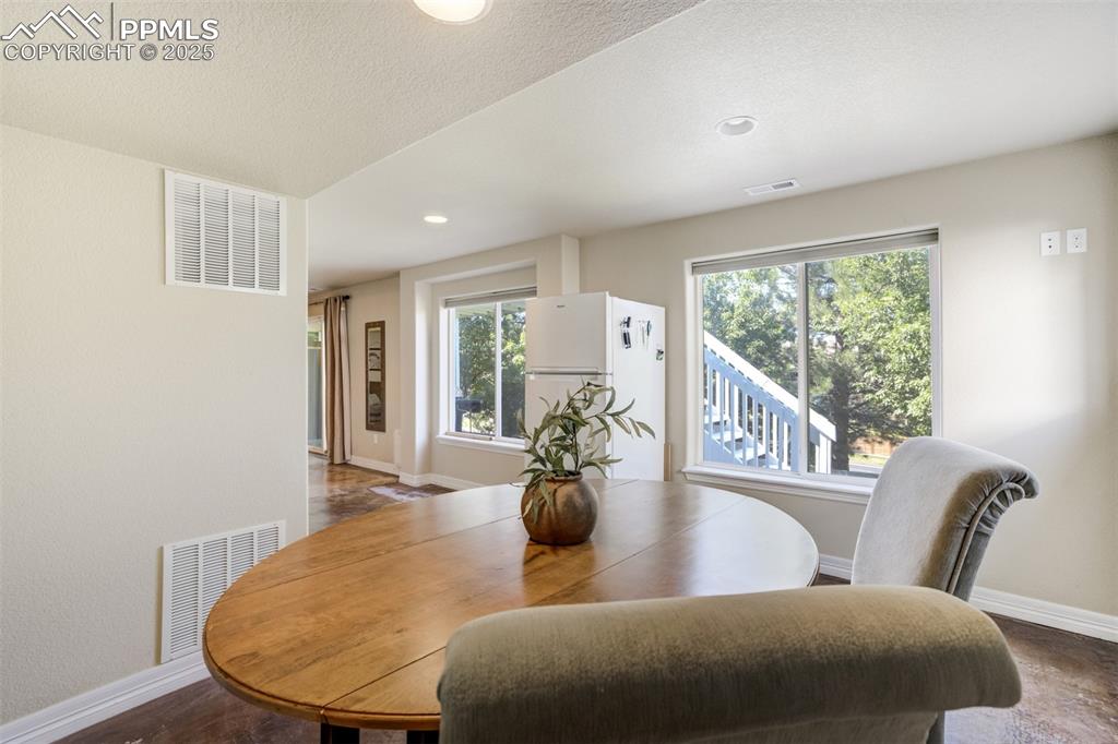 Image 38 of 50: Flex space in the basement. Could be a full kitchen, gym, spa/suana space..