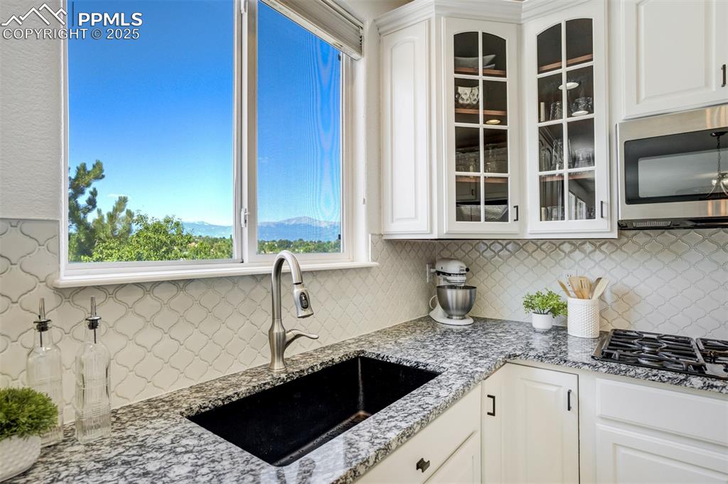 Image 8 of 50: An upgraded single-bowl sink WITH mountain views will change the way you do