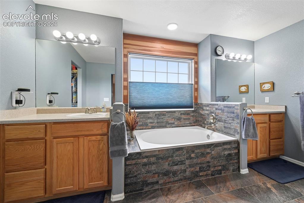 Image 18 of 49: Beautifully updated primary bathroom