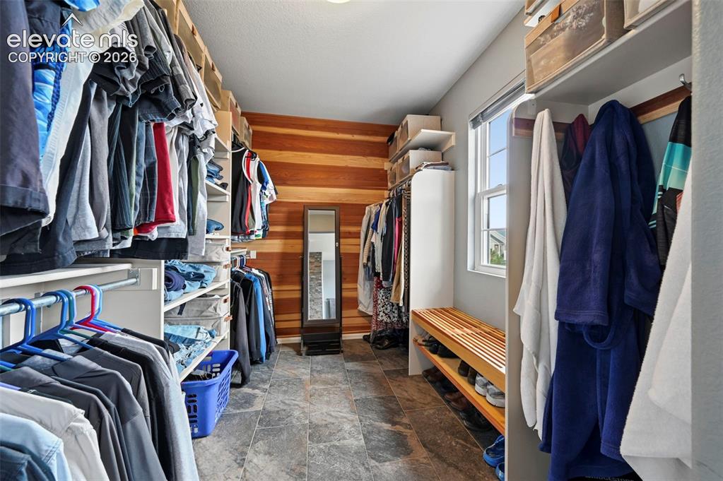 Image 21 of 49: Stunning walk in closet primary bedroom, 