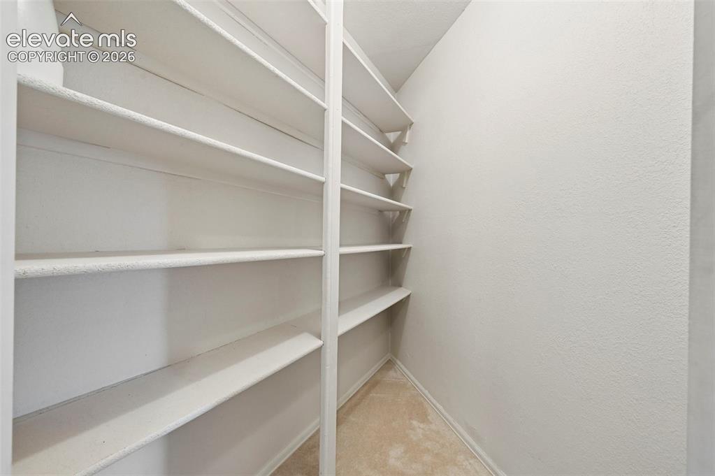 Image 37 of 49: Basement strorage closet