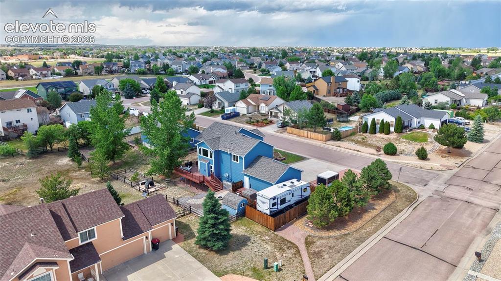 Image 40 of 49: East Side Yard, Mature Pines & RV Parking