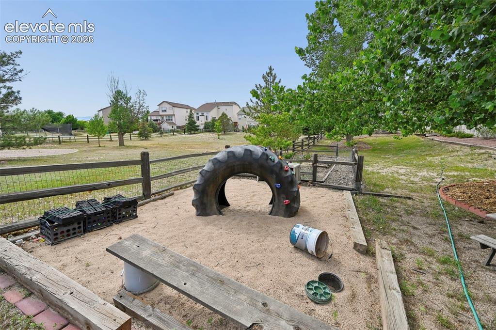 Image 47 of 49: Backyard sand box