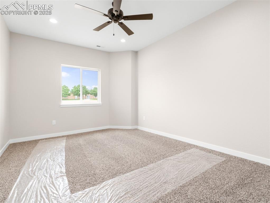 Image 19 of 38: Carpeted spare room featuring recessed lighting and a ceiling fan