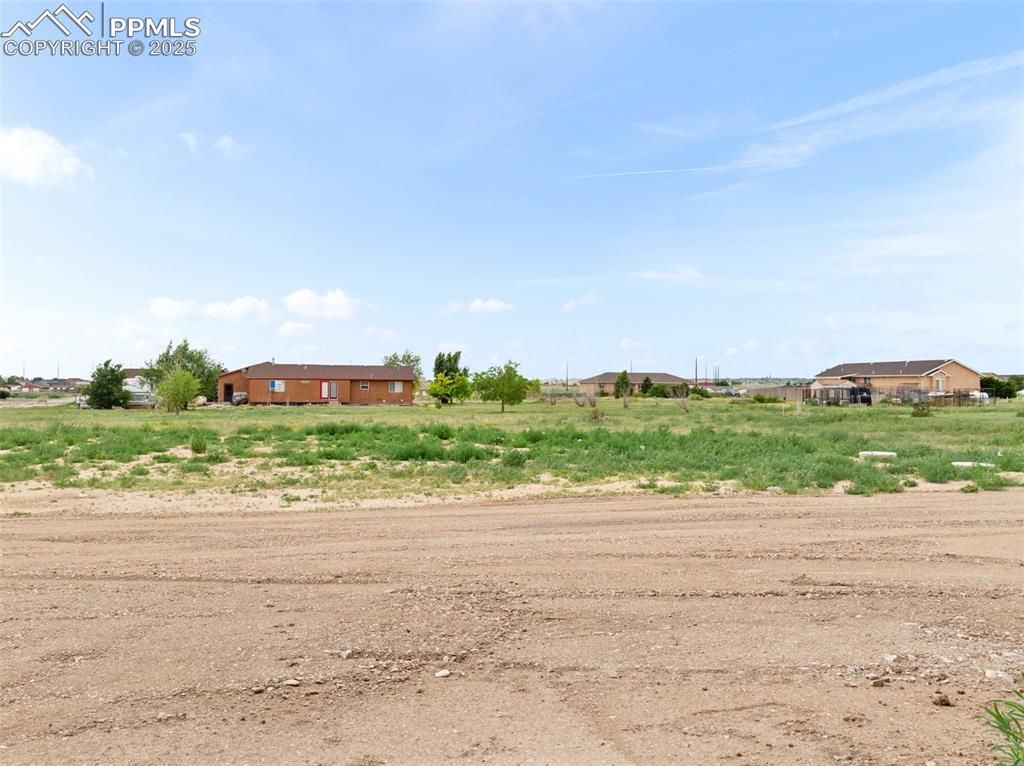 Image 32 of 38: View of yard featuring a view of rural / pastoral area