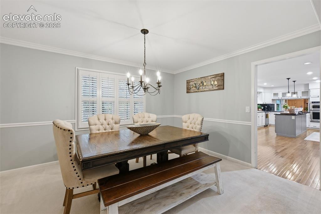 Image 13 of 49: Formal dining area