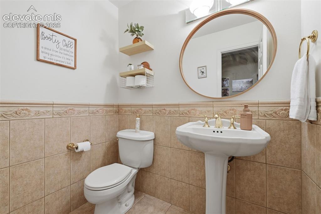 Image 14 of 49: Main floor 1/2 bath