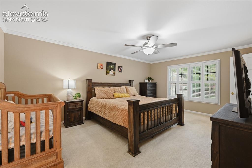 Image 22 of 49: Primary bedroom upper level, with primary bathroom suite and huge walk in c