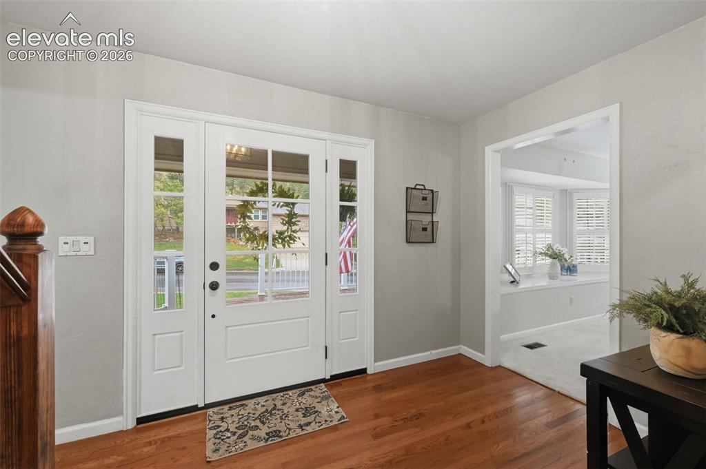 Image 7 of 49: Entry inside home