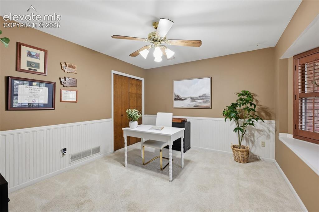 Image 9 of 49: Main floor bedroom/office