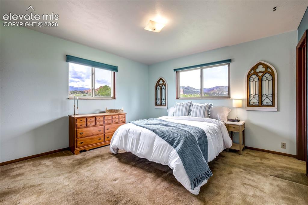 Image 16 of 50: Master Bedroom