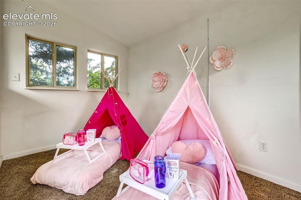 Image 43 of 50: Storage Shed in backyard could be a She Shed/Man Cave/Studio/Play House