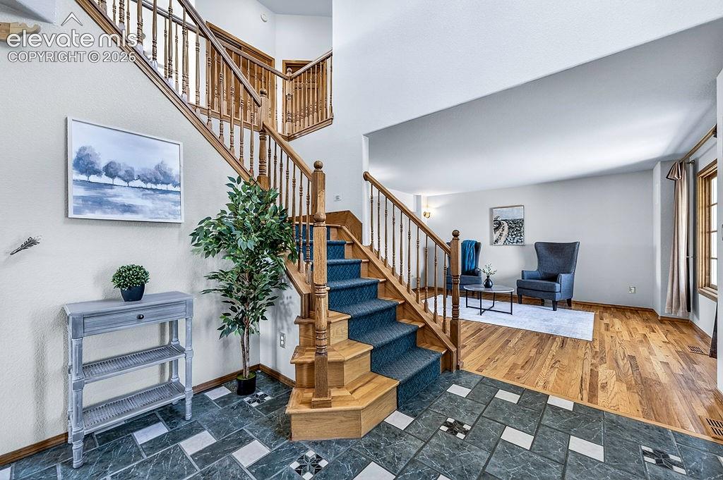 Image 10 of 50: Grand entrance with custom tile!