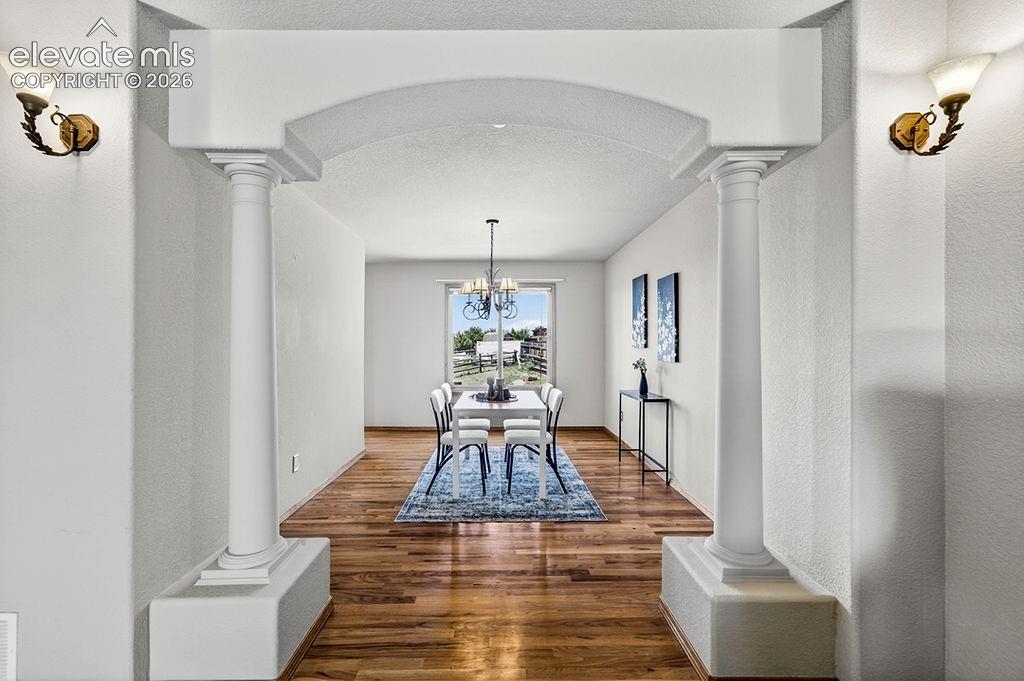 Image 13 of 50: Formal dining room.