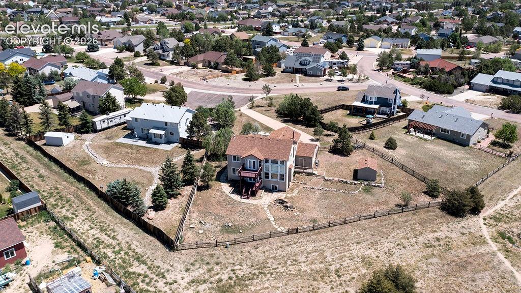 Image 49 of 50: Aerial view - shot from back of home