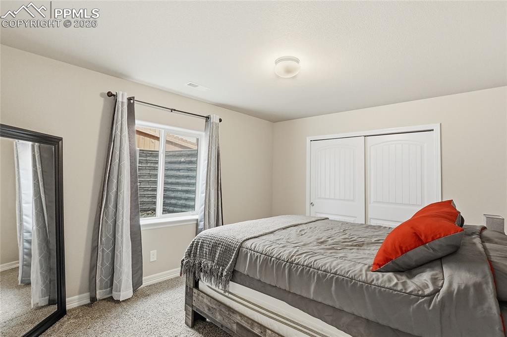 Image 31 of 39: Bedroom