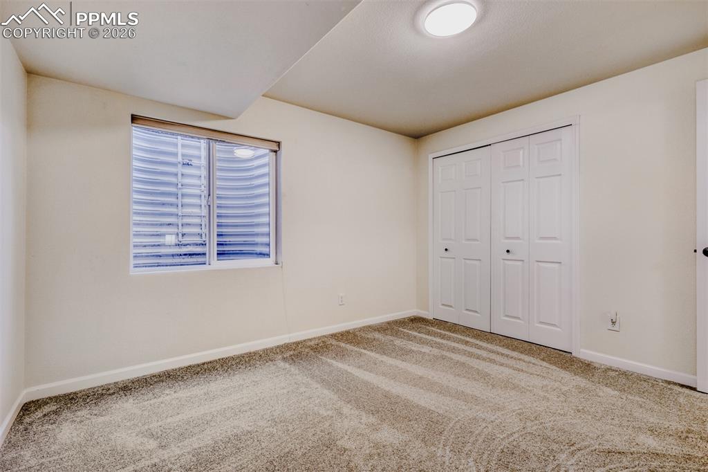 Image 18 of 29: Bedroom