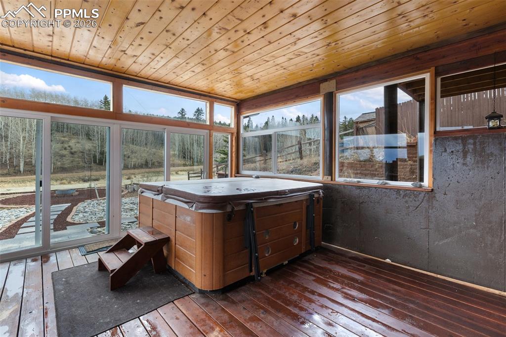 Image 43 of 50: Virtually Staged Dining and kitchen in basement