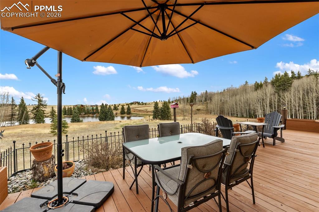 Image 9 of 50: Ariel view of property and community pond