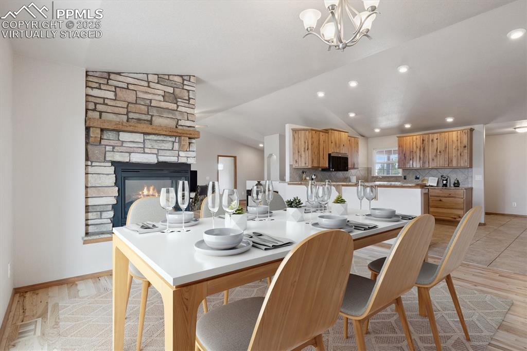 Image 13 of 42: Dining room towards kitchen *Virtually staged