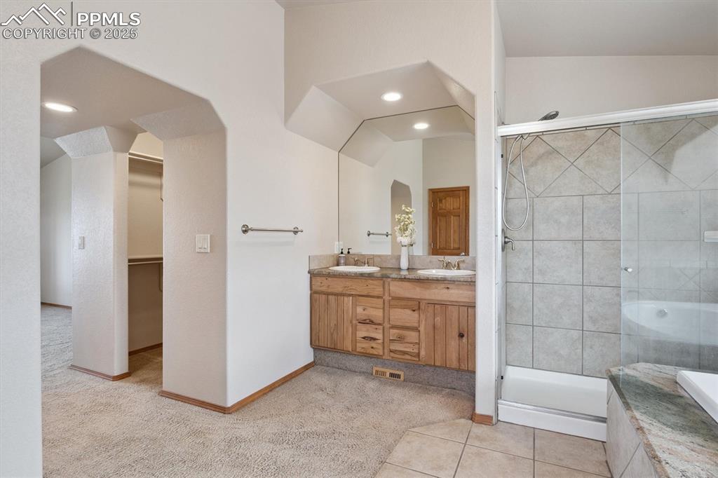 Image 25 of 42: Primary 5-piece bathroom