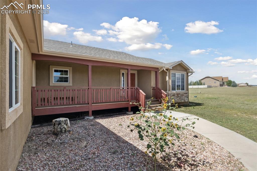 Image 4 of 42: Covered front porch
