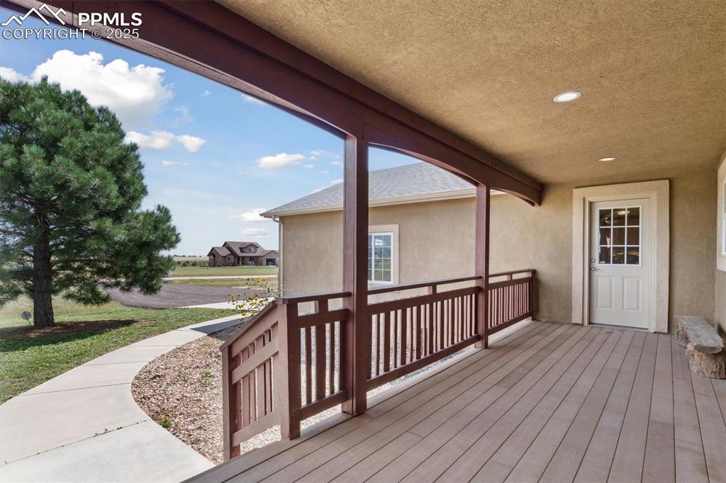 Image 7 of 42: Front porch towards driveway